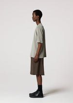 A model wears the IM MEN NAVY BOTTOMS navy-bottoms-trousers-light-grey-1.