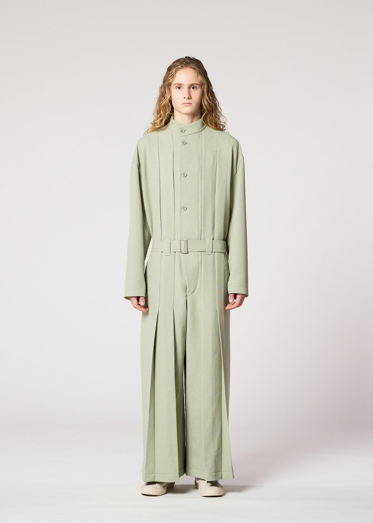A model wears the IM Men CORNICE jumpsuit.