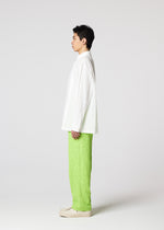 A model wears the IM MEN WHITE SHIRT prêt à porter.