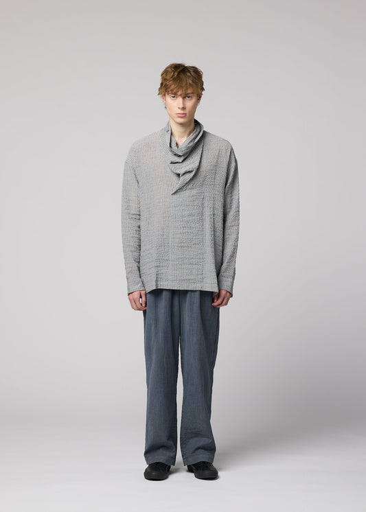 A model wears the IM Men STRIPE LINEN SHRINK shirt.