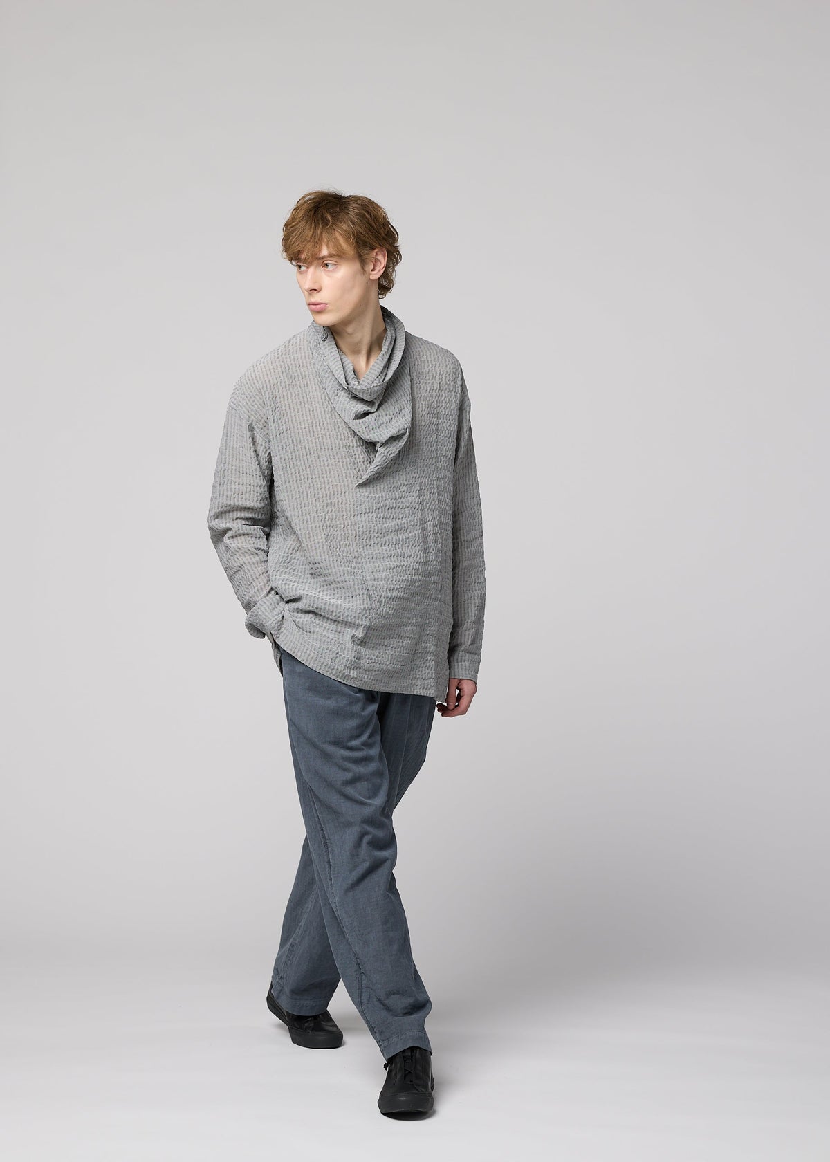 A model wears the IM Men STRIPE LINEN SHRINK shirt.