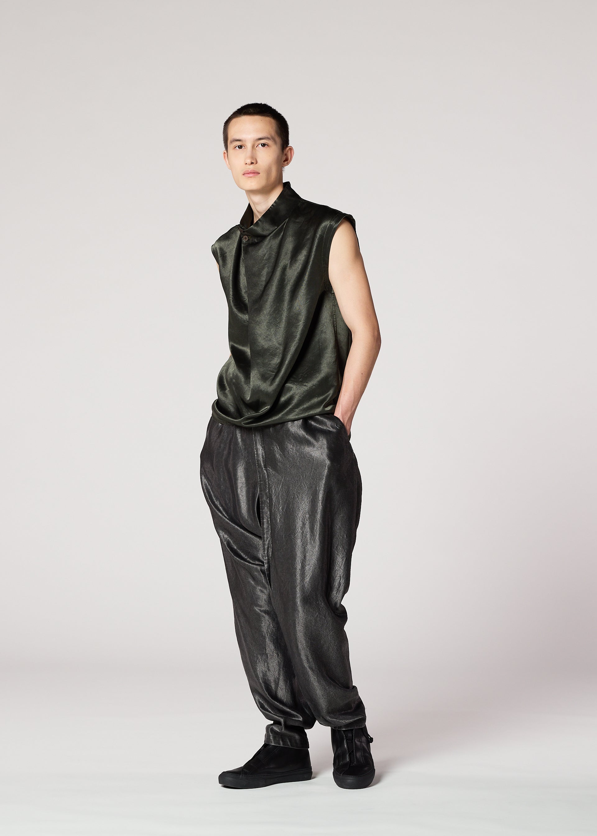 A model wears the IM Men SATIN WASH top.