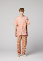 A model wears the IM Men UROKOMON T prêt à porter.