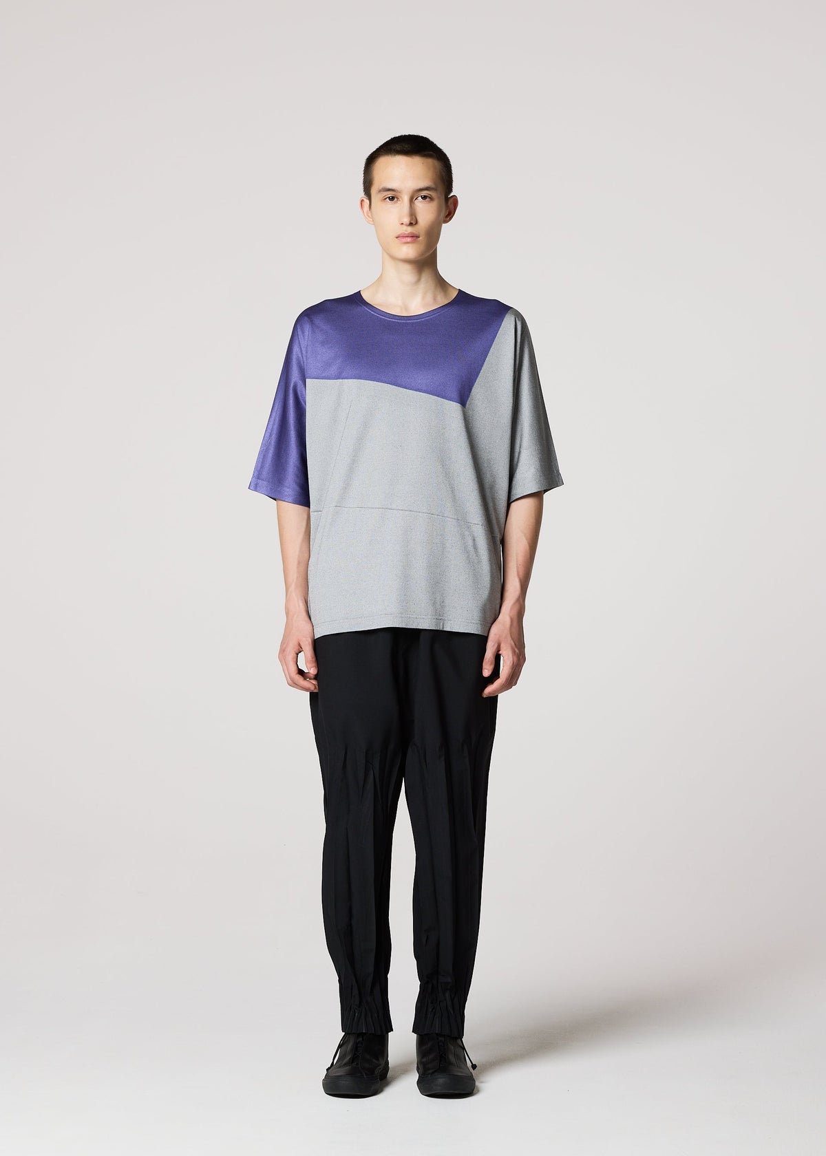 A model wears the IM Men GEOMETRY PLATING JERSEY t shirt.