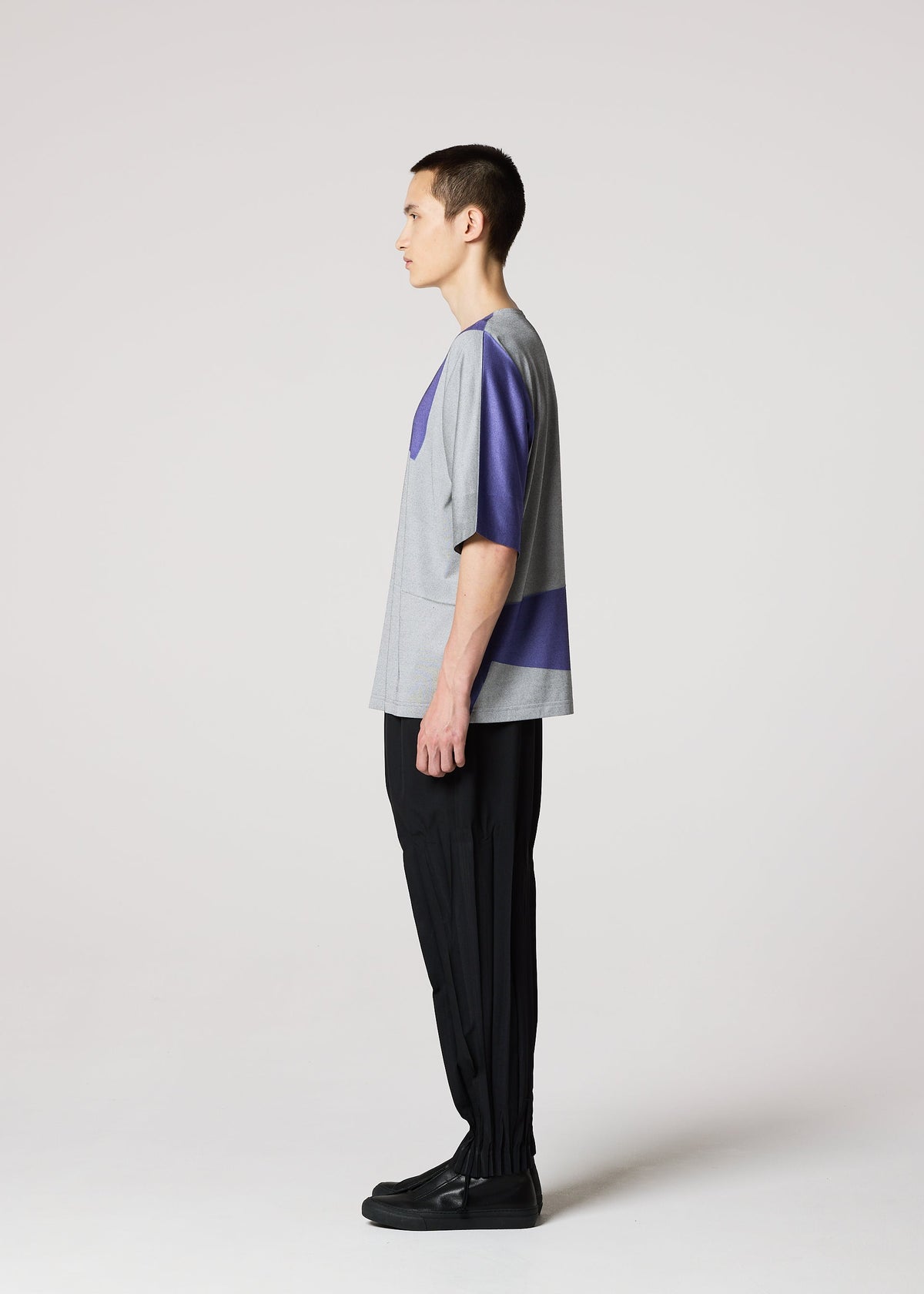 A model wears the IM Men GEOMETRY PLATING JERSEY t shirt.