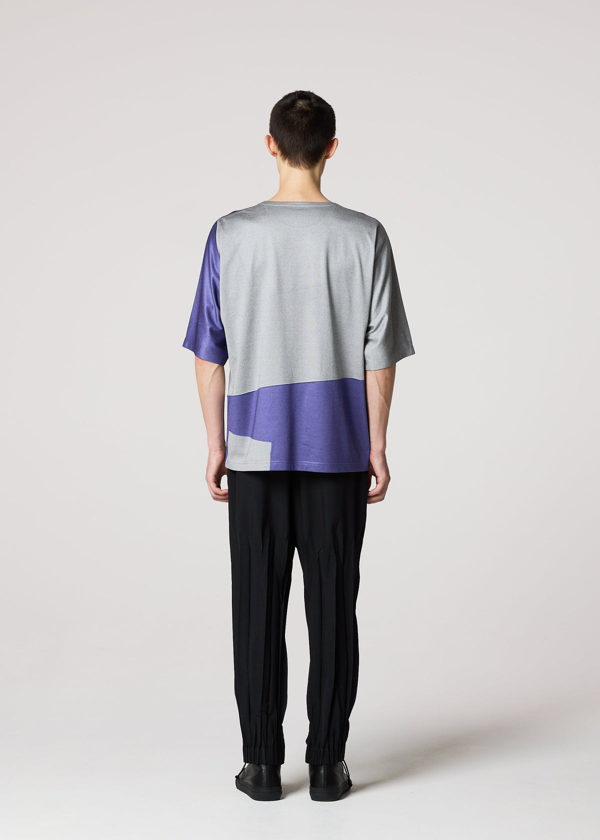 A model wears the IM Men GEOMETRY PLATING JERSEY t shirt.