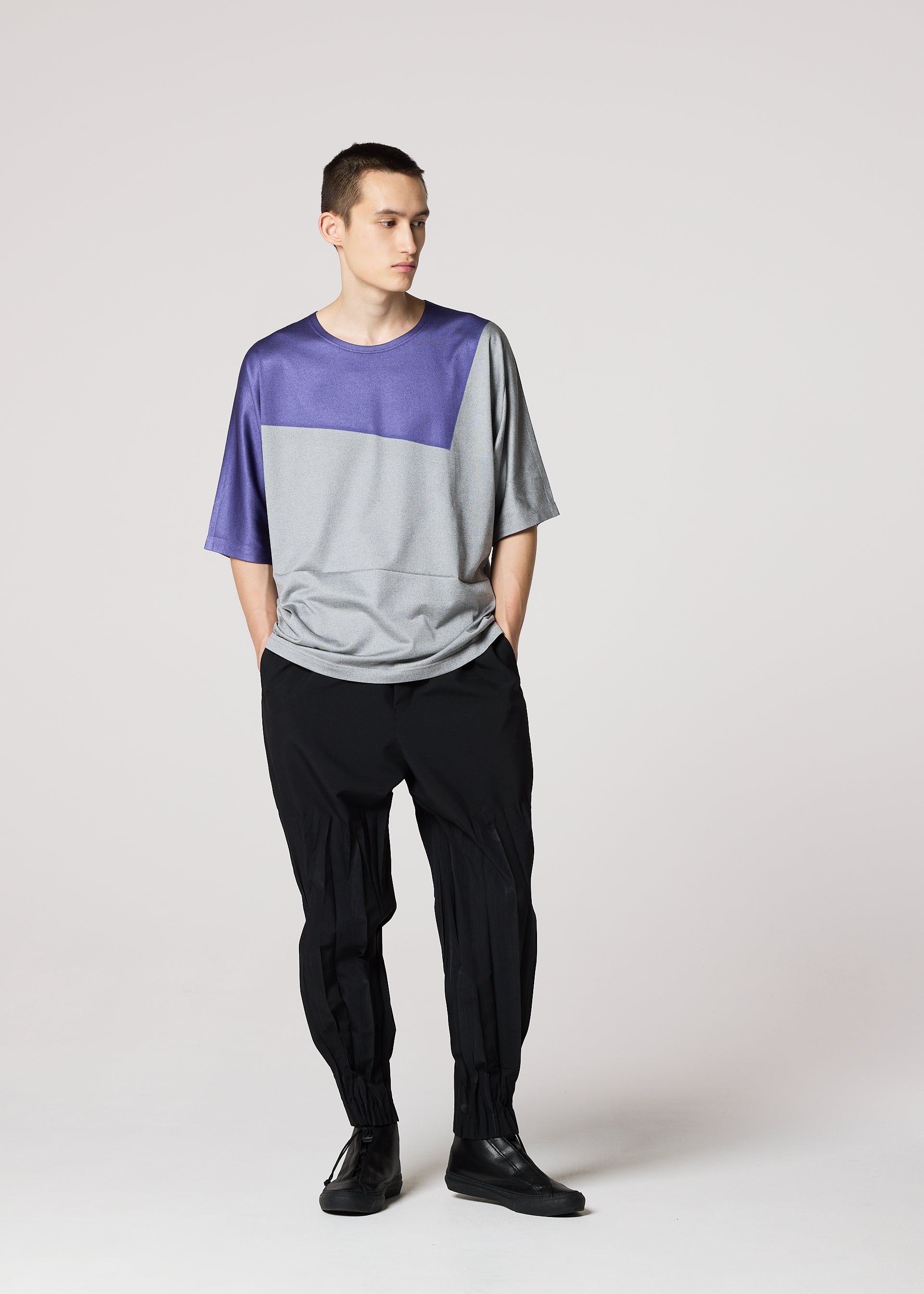 A model wears the IM Men GEOMETRY PLATING JERSEY t shirt.