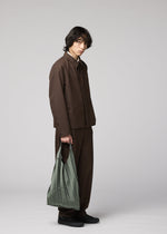 A model wears the IM MEN GURU GURU guru-guru-bag-2.