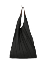 A product shot of the IM MEN GURU GURU bag in black.