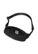 A detail shot of the IM MEN CUMMERBUND BAG bag.