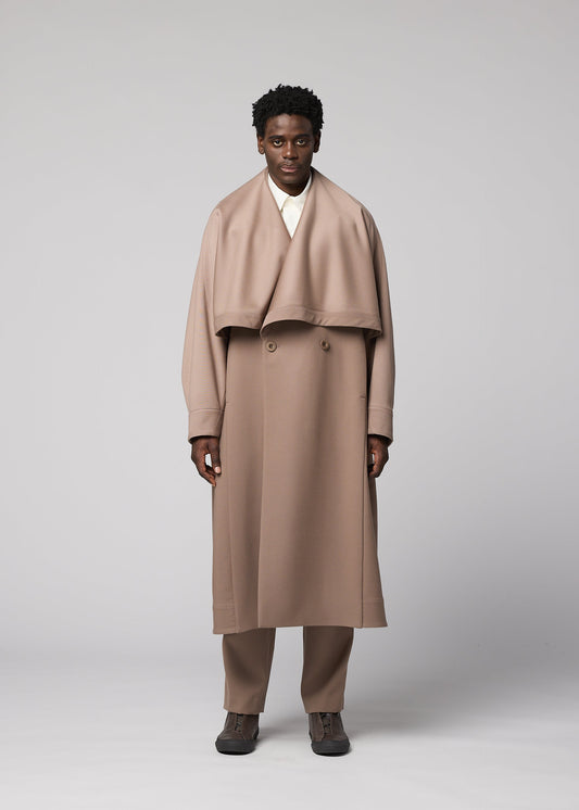 A model wears the IM MEN FRONT BACK coat.