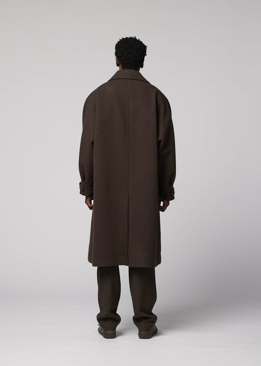 A model wears the IM MEN FULLER WOOL coat.