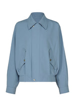A product shot of the IM MEN COMFORT COTTON blouson in saxe blue.