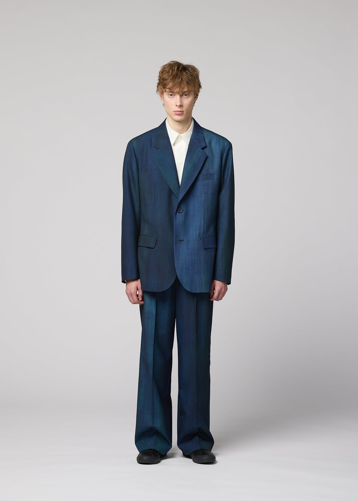 A model wears the IM MEN GRADATION WOOL jacket.