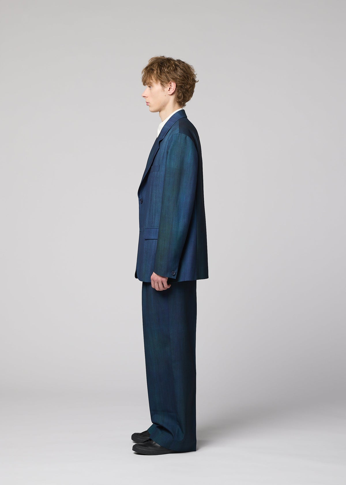 A model wears the IM MEN GRADATION WOOL jacket.