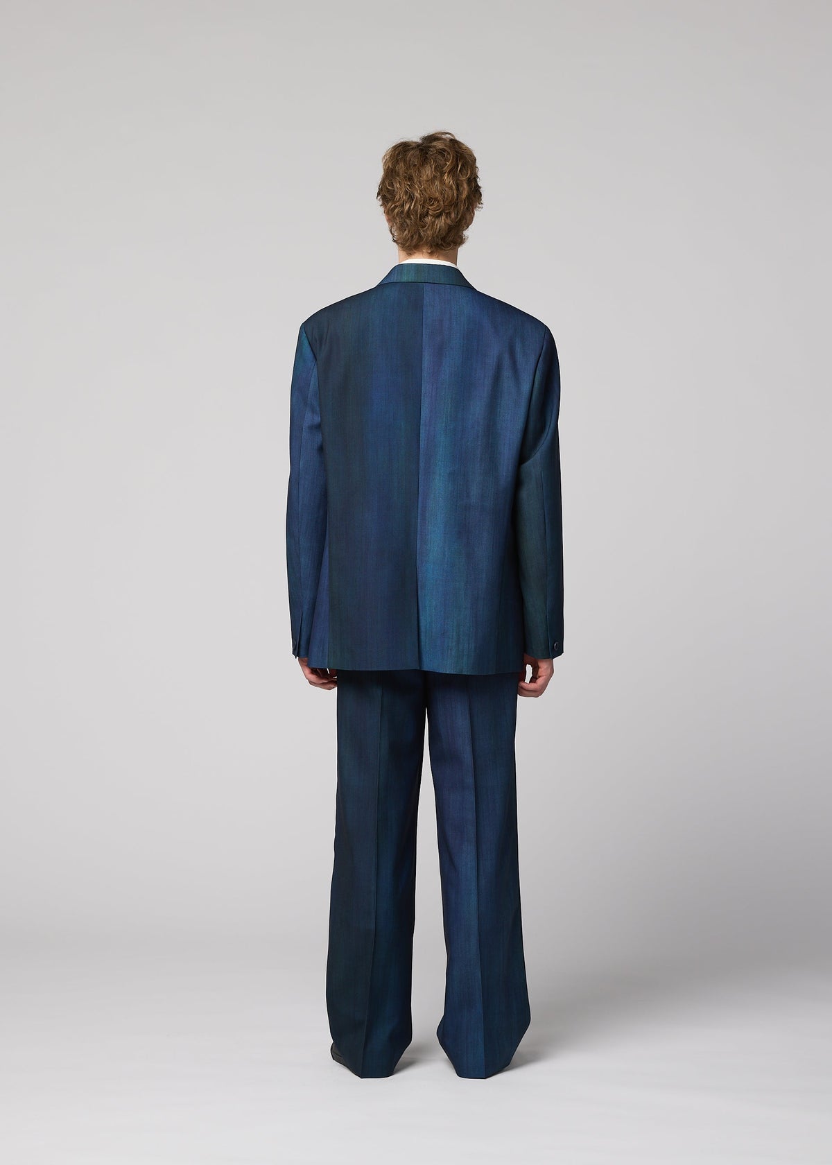 A model wears the IM MEN GRADATION WOOL jacket.
