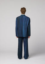 A model wears the IM MEN GRADATION WOOL jacket.