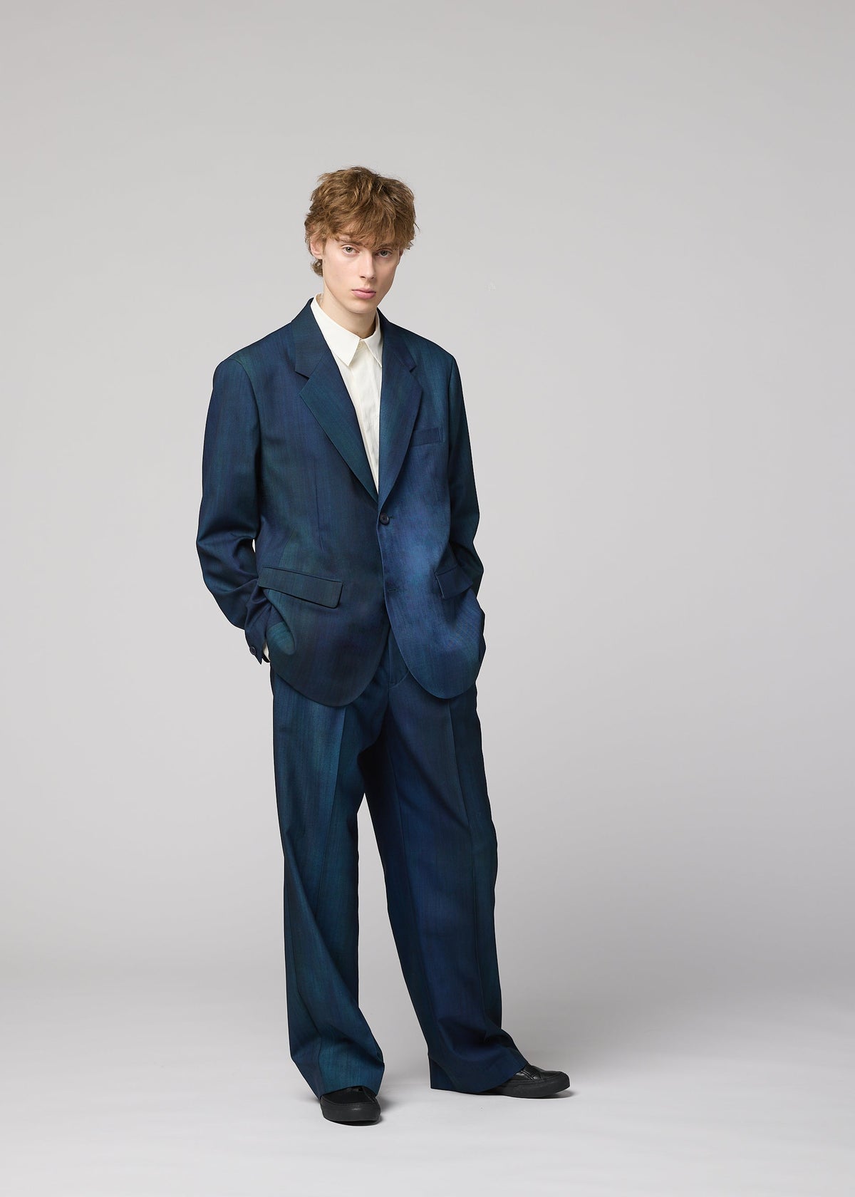 A model wears the IM MEN GRADATION WOOL jacket.