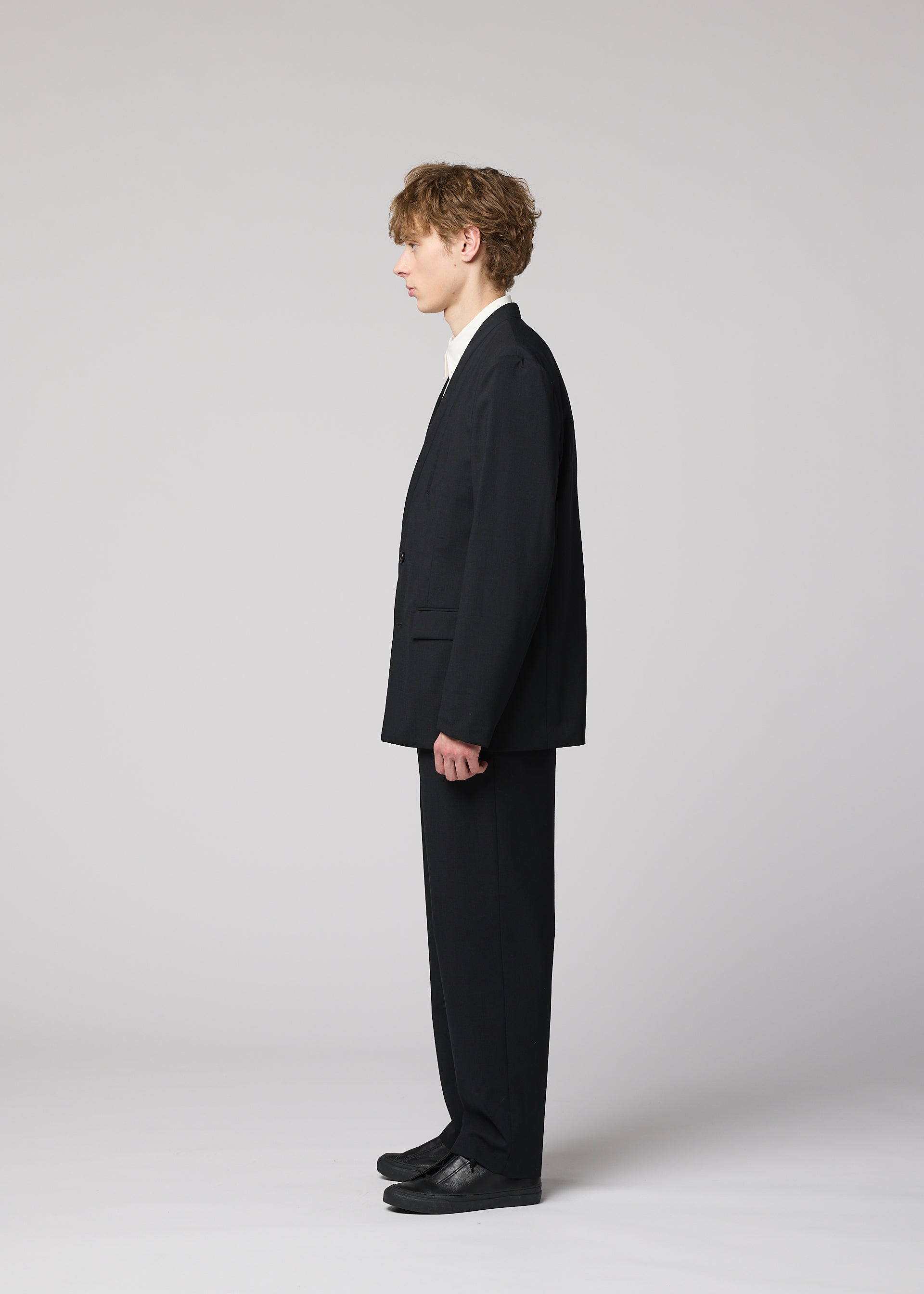 A model wears the IM MEN SUAVE suave-jacket-black-1.