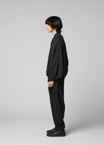 A model wears the IM MEN SWING BLACK swing-black-trousers-black-fw26.