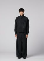A model wears the IM MEN WAFT BLACK waft-black-trousers-black-1-fw26.