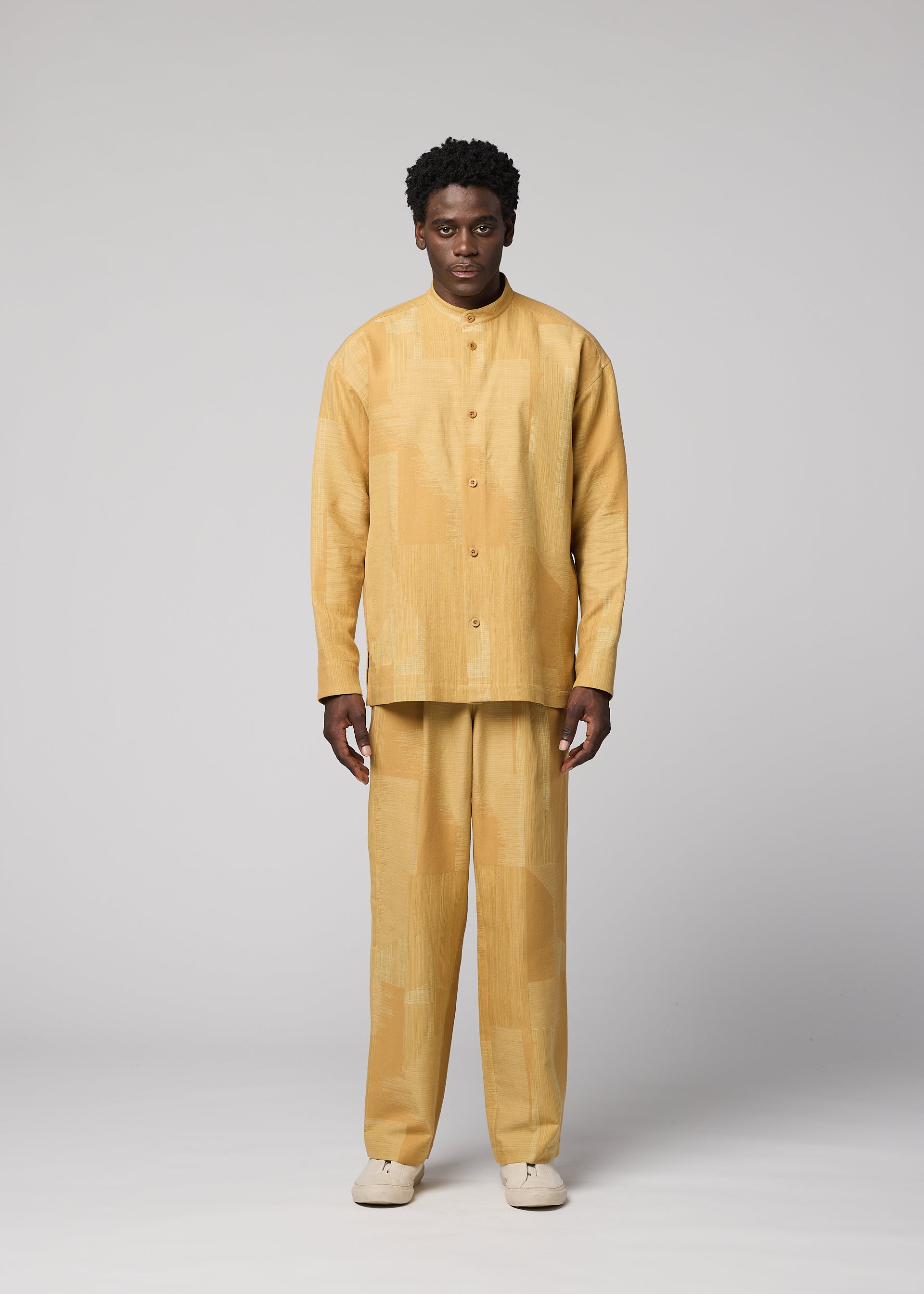 A model wears the IM MEN KASURI kasuri-trousers-black-2.