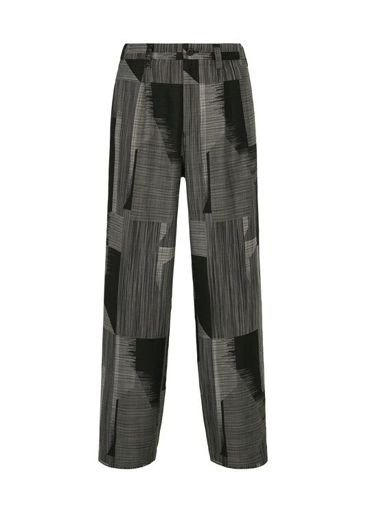 A product shot of the IM MEN KASURI pants in black.