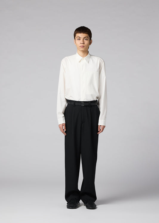A model wears the IM MEN FRONT BACK trousers.