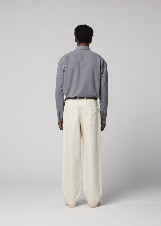 A model wears the IM MEN TOUGH WOOL COTTON trousers.