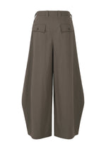 A detail shot of the IM MEN OVERLAP trousers.