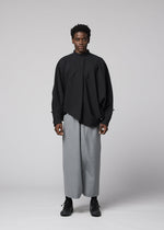 A model wears the IM MEN SUAVE suave-trousers-brown-2.