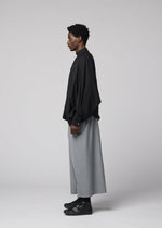 A model wears the IM MEN SUAVE suave-trousers-grey.