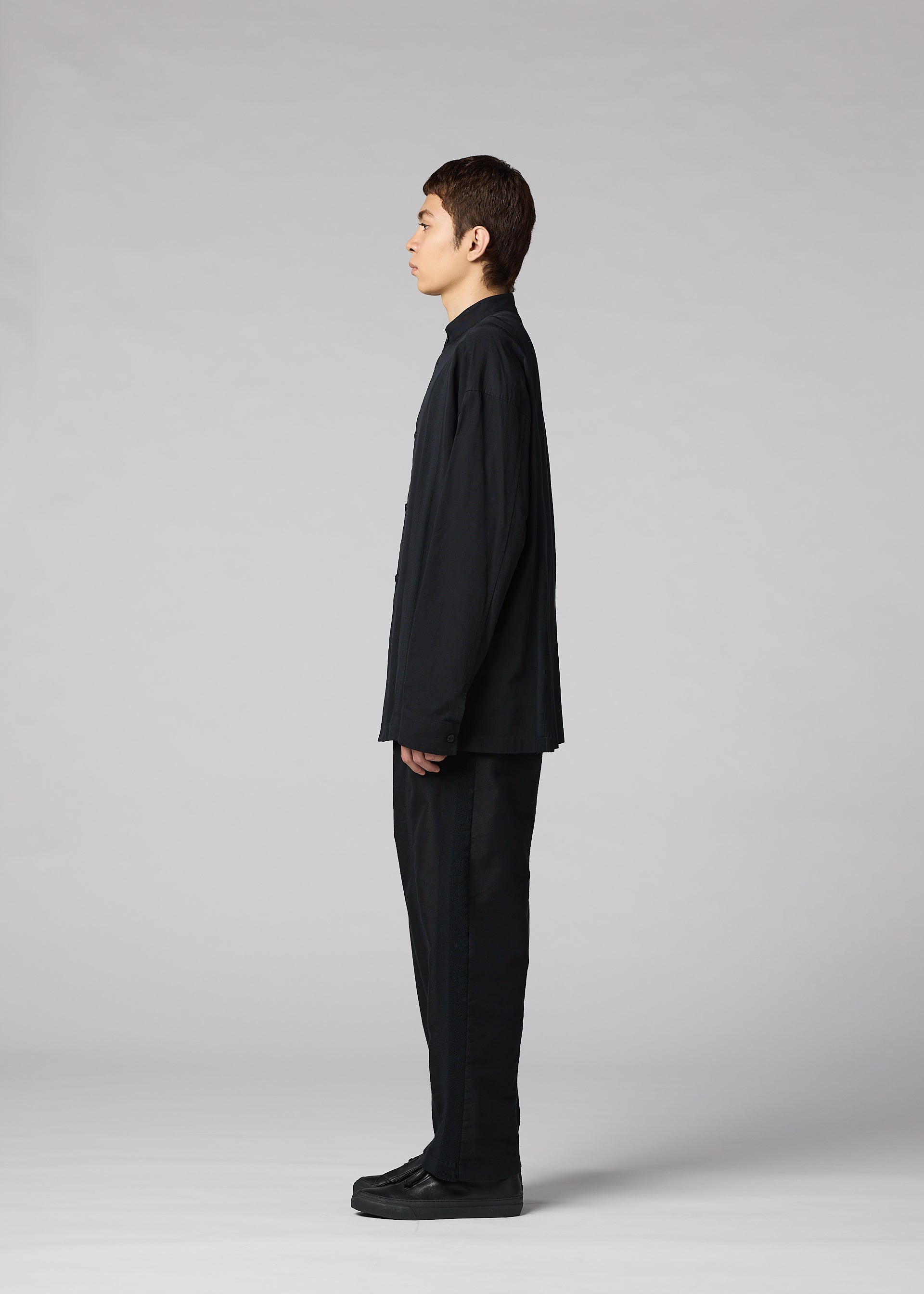 A model wears the IM MEN CLAY SHIRT clay-shirt-shirt-black-1.