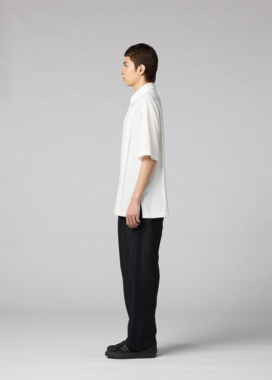 A model wears the IM MEN CLAY SHIRT clay-shirt-shirt-white-2.