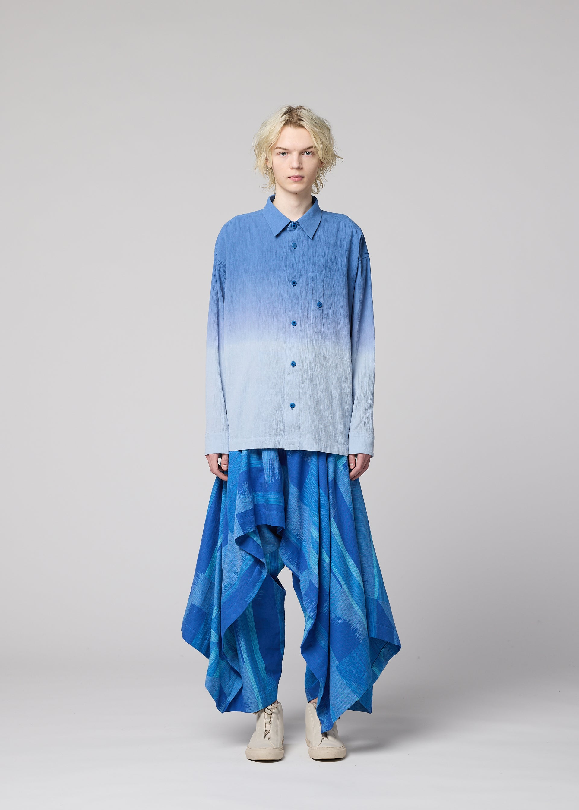 A model wears the IM MEN DRIP SHIRT drip-shirt-shirt-blue.