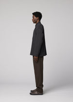 A model wears the IM MEN DOUBLE WEAVE CREPE shirt.