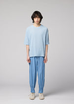 A model wears the IM MEN CREPE TUCK JERSEY crepe-tuck-jersey-t-shirt-black.