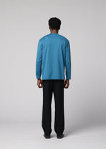 A model wears the IM MEN 40/2 JERSEY STITCH shirt.