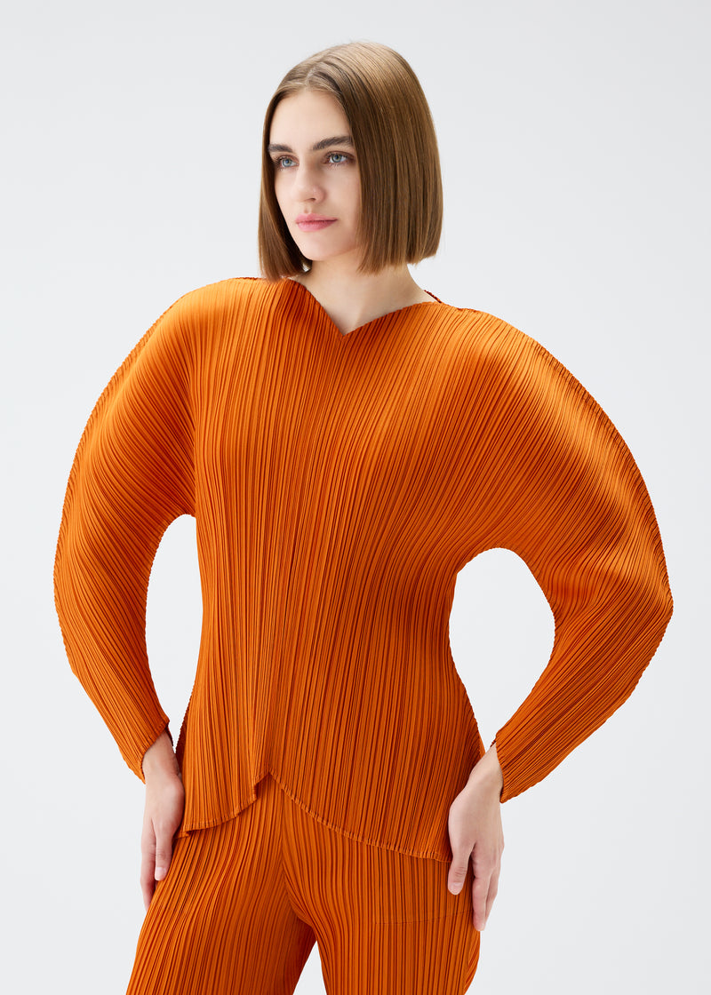 WORMHOLE Top Dark Orange