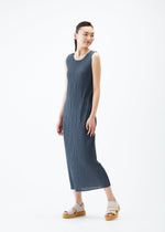 A model wears the PLEATS PLEASE ISSEY MIYAKE MONTHLY COLORS MAY dress.