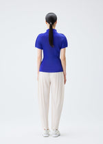 A model wears the Pleats Please Issey Miyake MIST SEPTEMBER top.