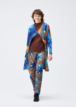 A model wears the Pleats Please Issey Miyake CARNIVAL coat.