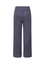 A detail shot of the PLEATS PLEASE ISSEY MIYAKE COTTON DENIM trousers.