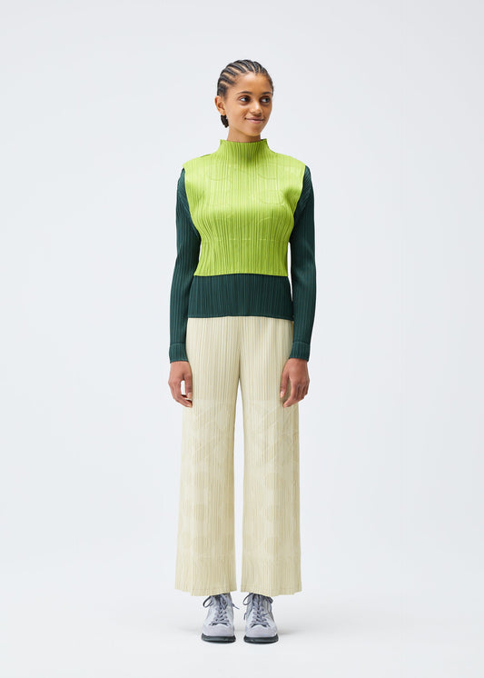 A model wears the Pleats Please Issey Miyake TUNE trousers.