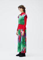 A model wears the Pleats Please Issey Miyake CARNIVAL trousers.