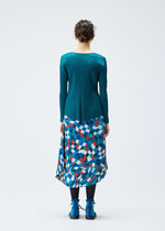 A model wears the PLEATS PLEASE ISSEY MIYAKE DANCING SQUARE skirt.