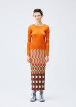 A model wears the Pleats Please Issey Miyake HARMONY skirt.