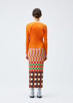 A model wears the Pleats Please Issey Miyake HARMONY skirt.