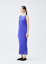 A model wears the PLEATS PLEASE ISSEY MIYAKE WAVE dress.