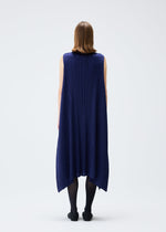 A model wears the Pleats Please Issey Miyake EFFICIENT SQUARE 2 dress.